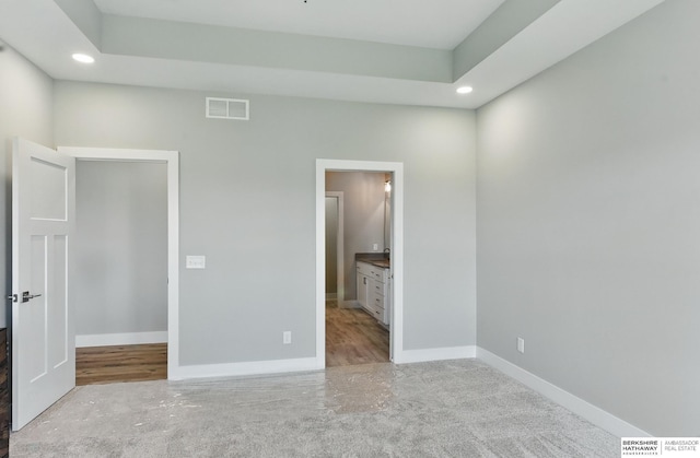 6320 Harvest Dr, Papillion, NE 68133 - unfurnished bedroom featuring recessed lighting, baseboards, ensuite bathroom, and carpet flooring