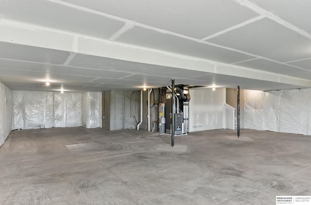 6320 Harvest Dr, Papillion, NE 68133 - unfinished below grade area featuring electric water heater and heating unit