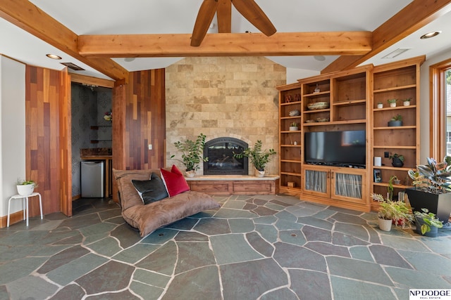 423 Fairacres Rd, Omaha, NE 68132 - living room featuring stone flooring, a large fireplace, and recessed lighting