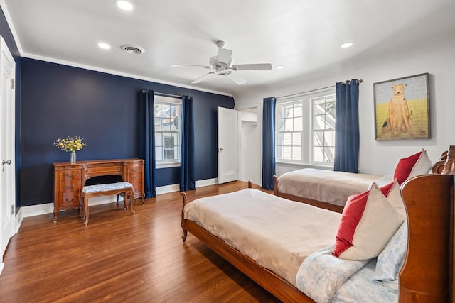 423 Fairacres Rd, Omaha, NE 68132 - bedroom with multiple windows, wood finished floors, baseboards, and recessed lighting