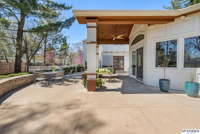 423 Fairacres Rd, Omaha, NE 68132 - view of patio featuring a ceiling fan, outdoor dining area, french doors, and an outdoor living space