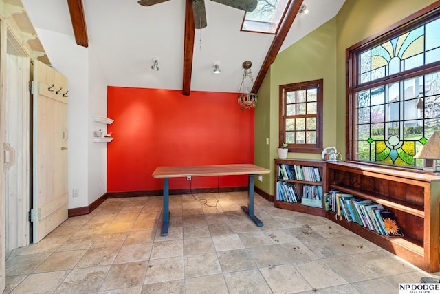 423 Fairacres Rd, Omaha, NE 68132 - rec room with beamed ceiling, baseboards, a skylight, a ceiling fan, and high vaulted ceiling
