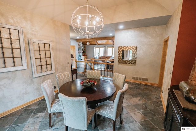 10955 N 58th Plz, Omaha, NE 68152 - dining area with dark stone finish flooring, a chandelier, baseboards, and recessed lighting