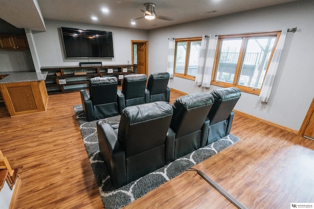 10955 N 58th Plz, Omaha, NE 68152 - cinema with a ceiling fan, light wood-type flooring, baseboards, and recessed lighting
