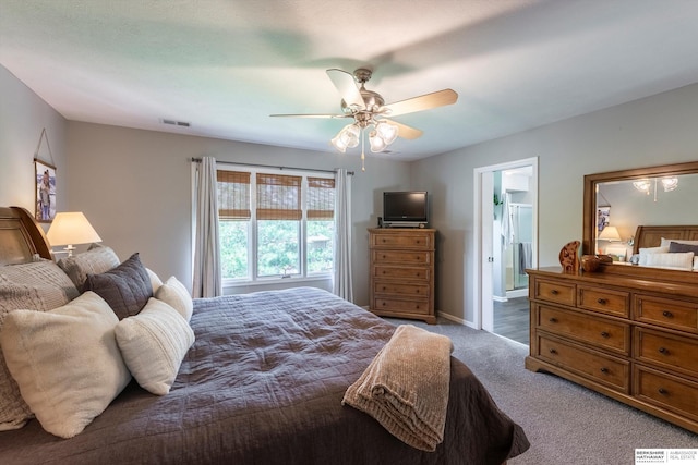 15210 Craig Cir, Bennington, NE 68007 - bedroom featuring carpet floors, ceiling fan, ensuite bath, and baseboards
