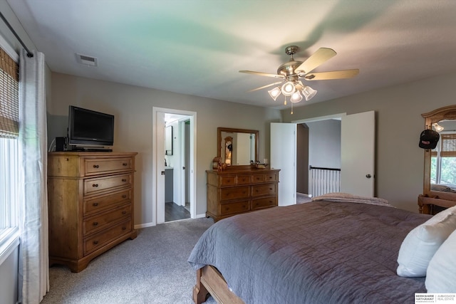 15210 Craig Cir, Bennington, NE 68007 - bedroom featuring light colored carpet, ceiling fan, and baseboards