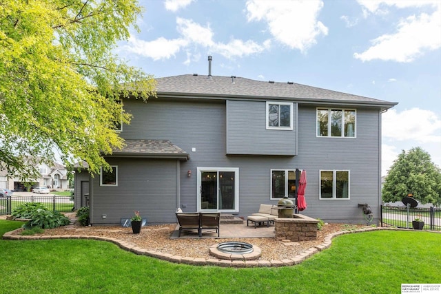15210 Craig Cir, Bennington, NE 68007 - rear view of property featuring a patio area and a fire pit