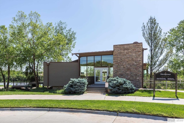 15210 Craig Cir, Bennington, NE 68007 - contemporary home featuring french doors