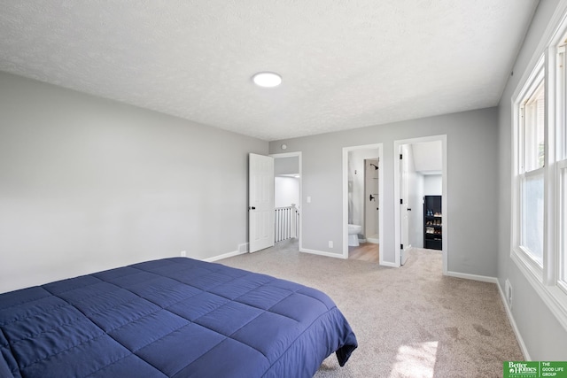 3501 Leawood Dr, Bellevue, NE 68123 - bedroom featuring light carpet, baseboards, and a textured ceiling