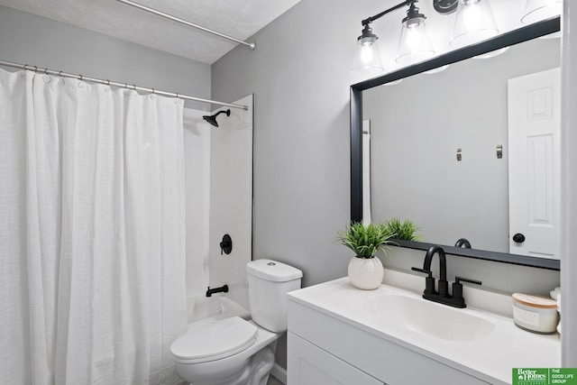 3501 Leawood Dr, Bellevue, NE 68123 - full bathroom with vanity, toilet, shower / tub combo, and a textured ceiling