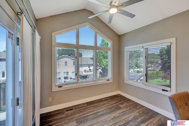 7627 S 38th St, Lincoln, NE 68516 - empty room featuring baseboards, dark wood-style flooring, lofted ceiling, and ceiling fan