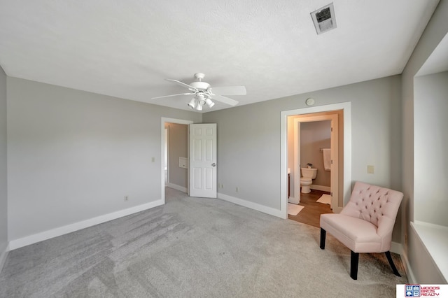 7627 S 38th St, Lincoln, NE 68516 - sitting room featuring baseboards, ceiling fan, and carpet
