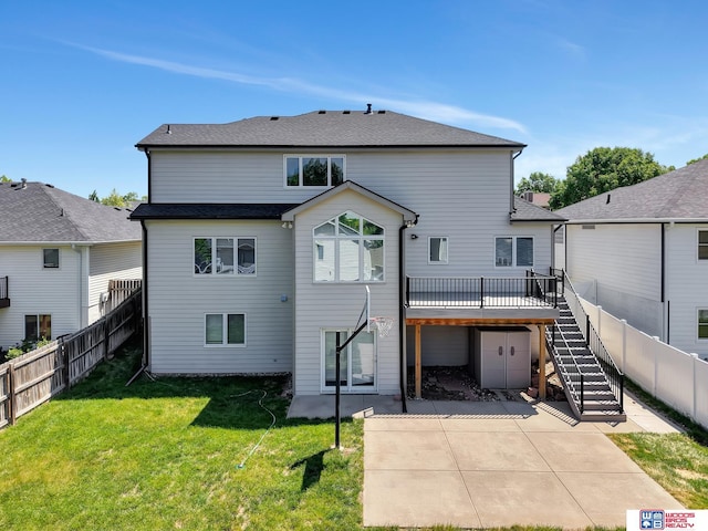 7627 S 38th St, Lincoln, NE 68516 - back of property with stairs, a patio area, and a deck
