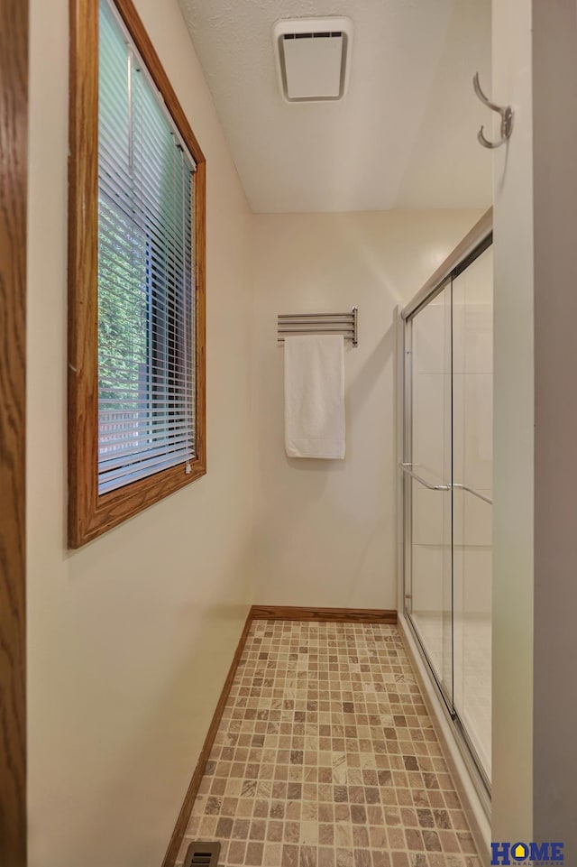 4801 S 72nd St, Lincoln, NE 68516 - full bathroom with baseboards and a shower stall