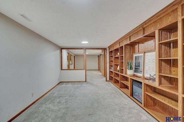4801 S 72nd St, Lincoln, NE 68516 - unfurnished living room featuring baseboards and light carpet