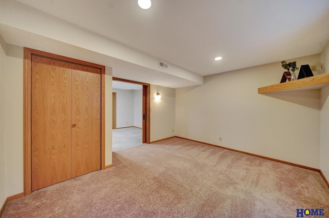 4801 S 72nd St, Lincoln, NE 68516 - finished basement with light carpet, baseboards, and recessed lighting