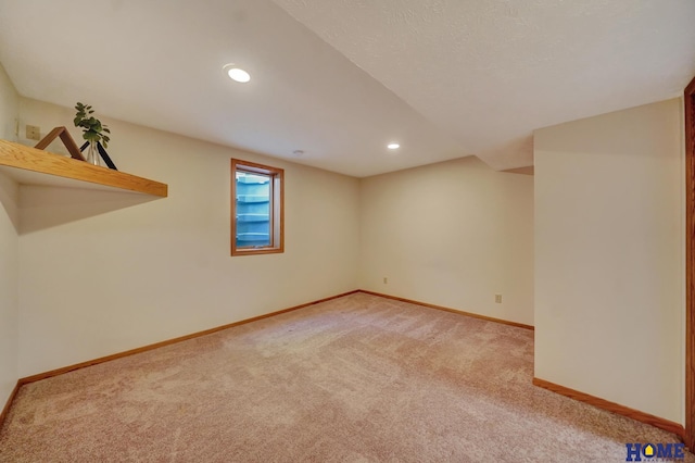 4801 S 72nd St, Lincoln, NE 68516 - below grade area with light colored carpet, baseboards, and recessed lighting