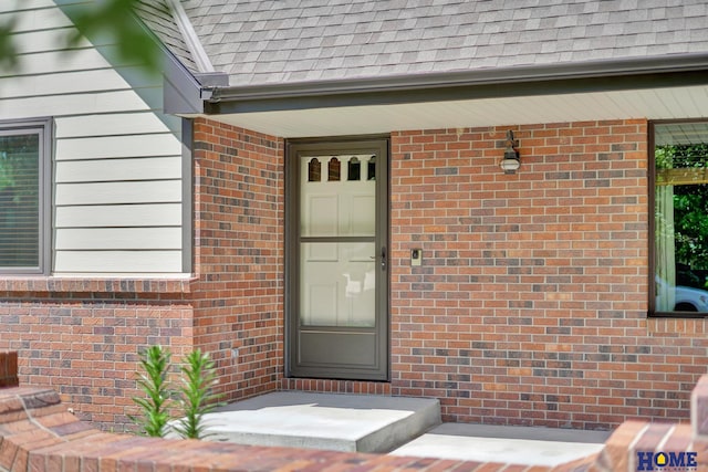 4801 S 72nd St, Lincoln, NE 68516 - entrance to property featuring brick siding and roof with shingles