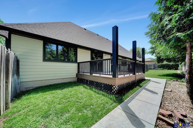 4801 S 72nd St, Lincoln, NE 68516 - view of home's exterior featuring a wooden deck and roof with shingles