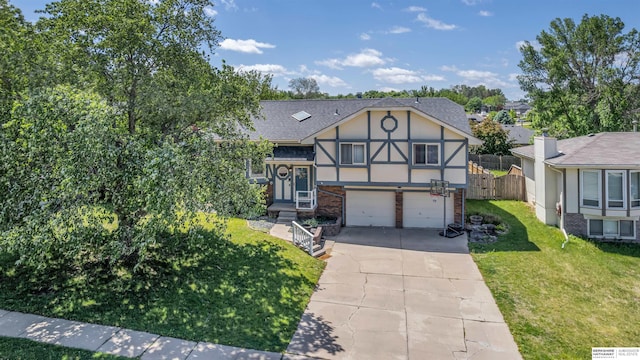 3507 Lookingglass Dr, Bellevue, NE 68123 - view of front facade featuring a garage, driveway, a shingled roof, brick siding, and stucco siding