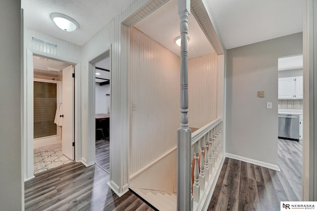 6844 Laurent Cir, Lincoln, NE 68526 - corridor featuring wood finished floors and baseboards