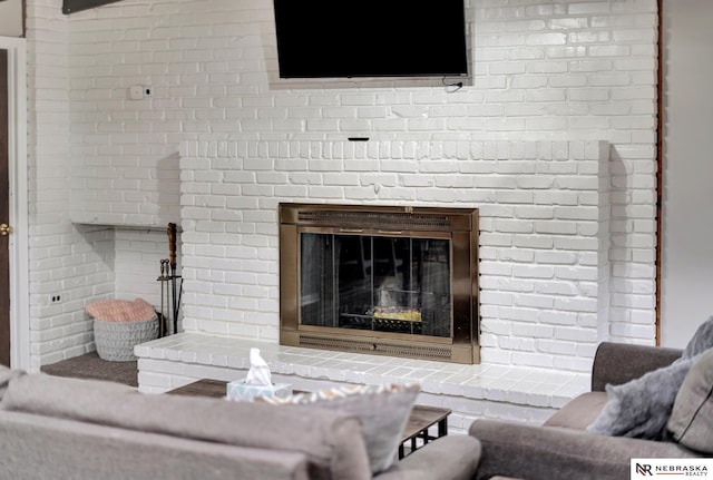 6844 Laurent Cir, Lincoln, NE 68526 - living area featuring a brick fireplace