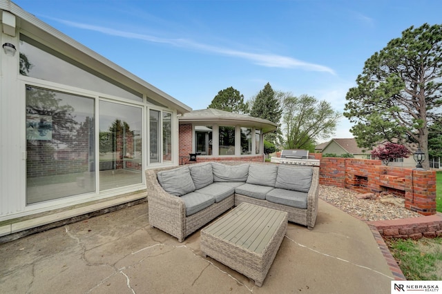 6844 Laurent Cir, Lincoln, NE 68526 - view of patio / terrace with area for grilling, an outdoor living space, and a sunroom