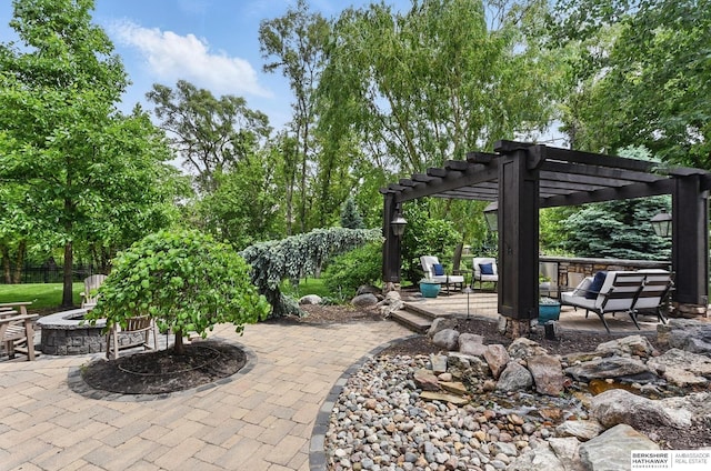 1419 N 188th St, Elkhorn, NE 68022 - view of patio / terrace with an outdoor fire pit and a pergola