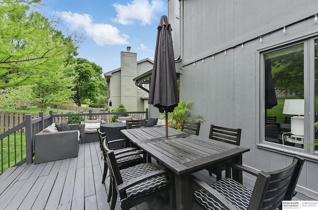1725 N 162nd St, Omaha, NE 68118 - wooden terrace with outdoor dining area and an outdoor living space