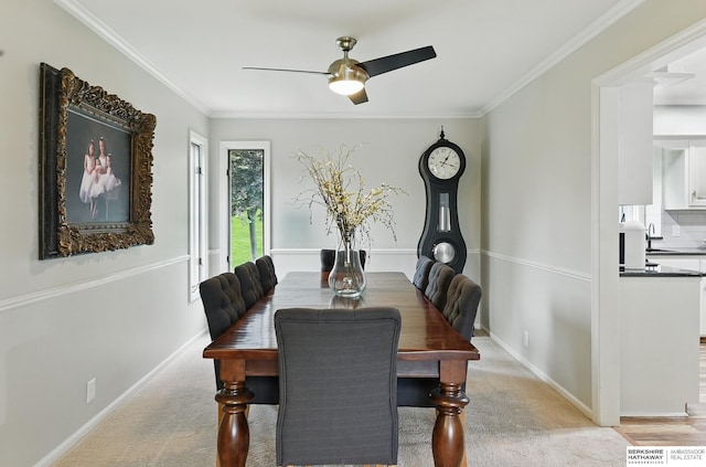 1725 N 162nd St, Omaha, NE 68118 - dining area featuring a ceiling fan, ornamental molding, baseboards, and light colored carpet