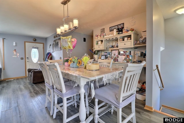 950 E 16th St, Fremont, NE 68025 - dining room featuring wood finished floors and baseboards
