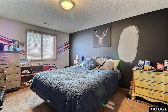 950 E 16th St, Fremont, NE 68025 - carpeted bedroom featuring a textured ceiling