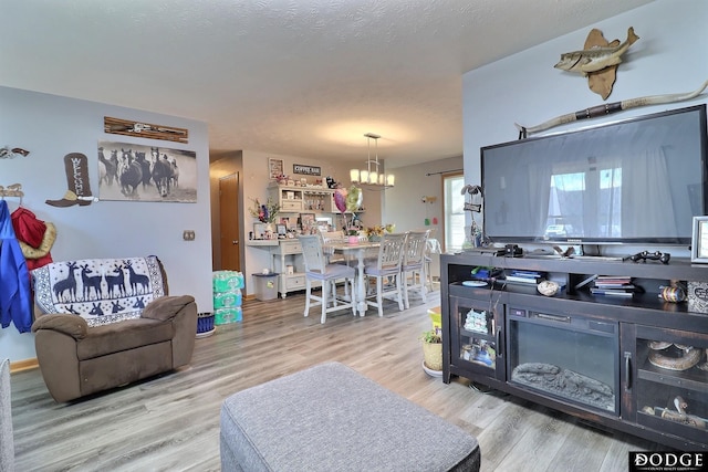 950 E 16th St, Fremont, NE 68025 - living room featuring a chandelier and wood finished floors