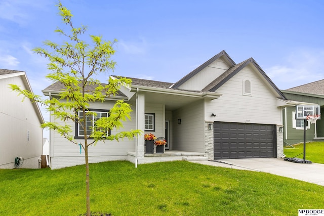 7717 N 108th St, Omaha, NE 68142 - view of front facade with a front lawn, a garage, and driveway