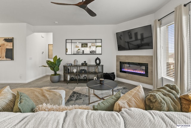 7717 N 108th St, Omaha, NE 68142 - living area featuring carpet flooring, a tile fireplace, baseboards, and a ceiling fan