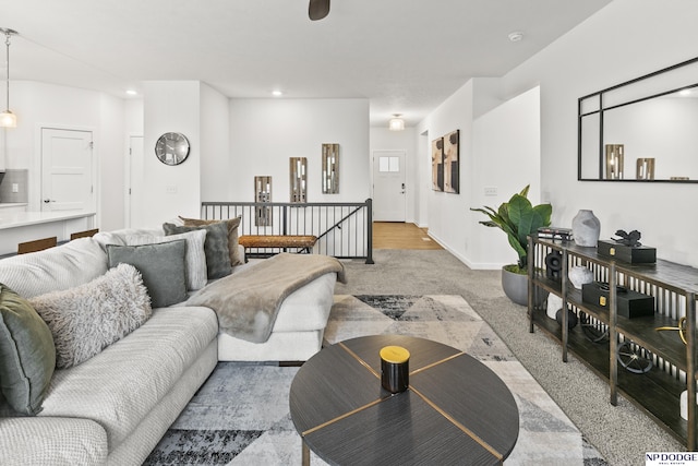 7717 N 108th St, Omaha, NE 68142 - living area with carpet flooring, recessed lighting, and baseboards