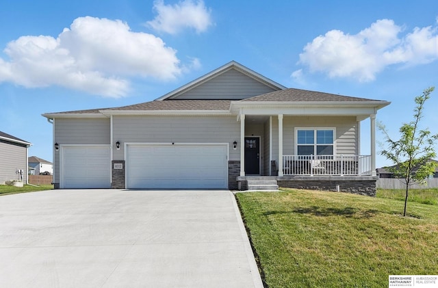 6312 Centennial Rd, Papillion, NE 68157 - single story home featuring concrete driveway, an attached garage, a front lawn, and a porch
