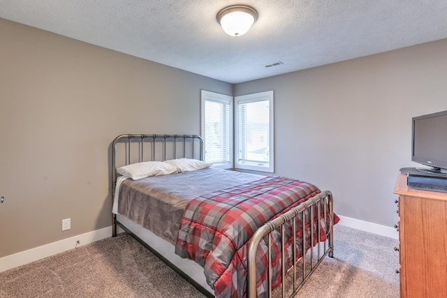 10311 S 124th St, Papillion, NE 68046 - carpeted bedroom with baseboards and a textured ceiling