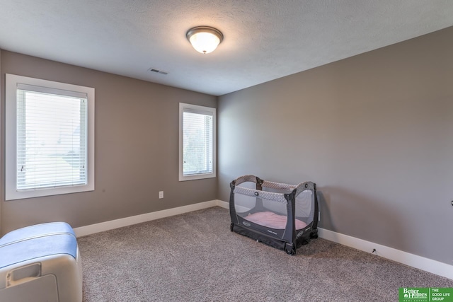 10311 S 124th St, Papillion, NE 68046 - unfurnished room with carpet flooring, baseboards, and a textured ceiling