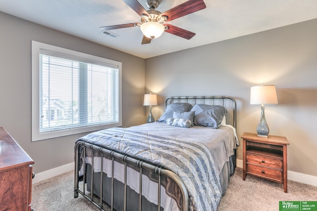 10311 S 124th St, Papillion, NE 68046 - carpeted bedroom featuring baseboards and a ceiling fan