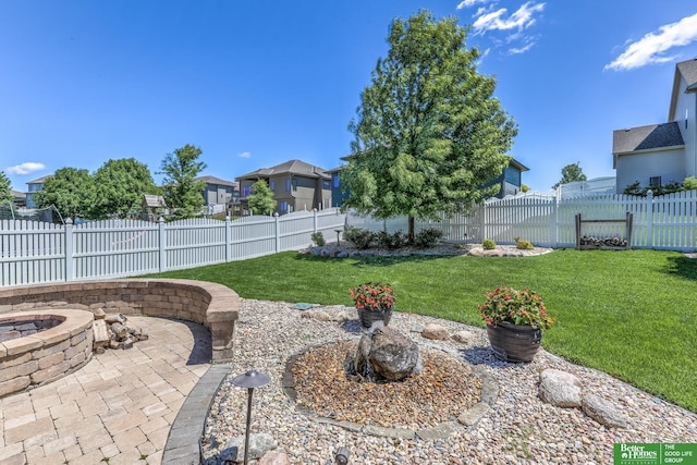 10311 S 124th St, Papillion, NE 68046 - view of yard with a fire pit, a patio, and a residential view