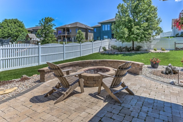 10311 S 124th St, Papillion, NE 68046 - view of patio featuring a fire pit