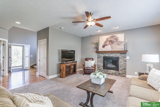 10311 S 124th St, Papillion, NE 68046 - carpeted living area with ceiling fan, a fireplace, baseboards, and recessed lighting