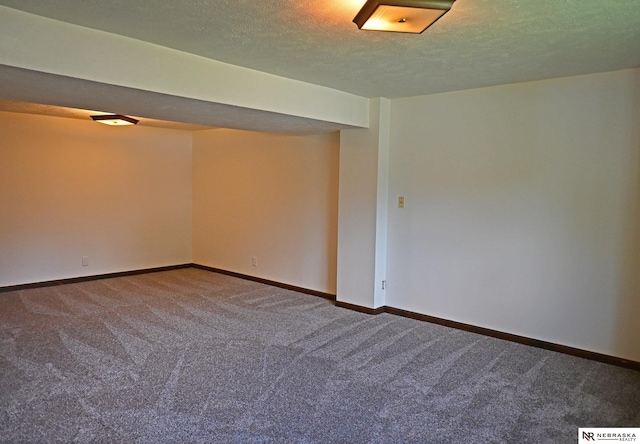 4841 N 130th Cir, Omaha, NE 68164 - empty room with carpet flooring, baseboards, and a textured ceiling