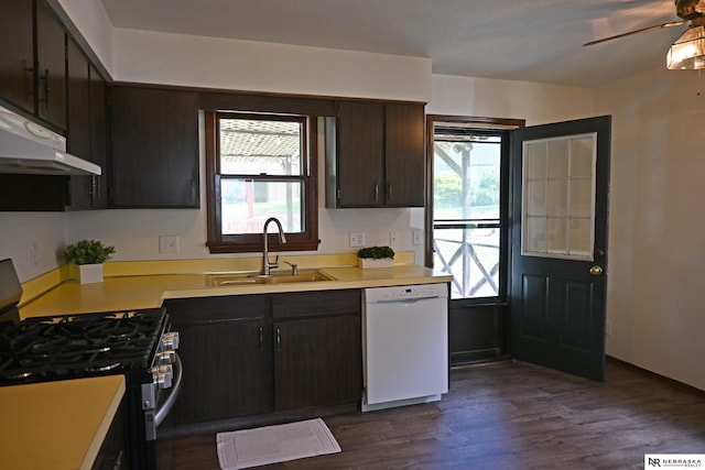 4841 N 130th Cir, Omaha, NE 68164 - kitchen featuring range with gas stovetop, dishwasher, a sink, under cabinet range hood, and light countertops