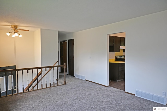 4841 N 130th Cir, Omaha, NE 68164 - carpeted empty room with a ceiling fan and baseboards