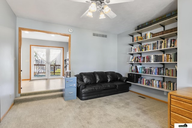 9521 N 140th St, Waverly, NE 68462 - living area with carpet, a ceiling fan, and baseboards