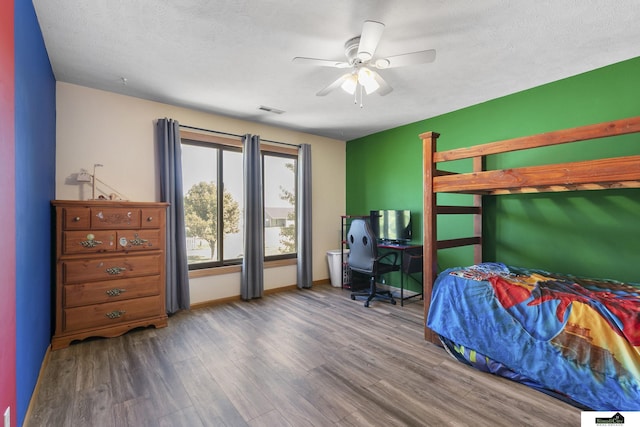 9521 N 140th St, Waverly, NE 68462 - bedroom with wood finished floors, baseboards, and ceiling fan