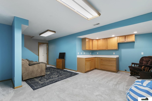 9521 N 140th St, Waverly, NE 68462 - kitchen featuring light carpet, open floor plan, light countertops, baseboards, and recessed lighting