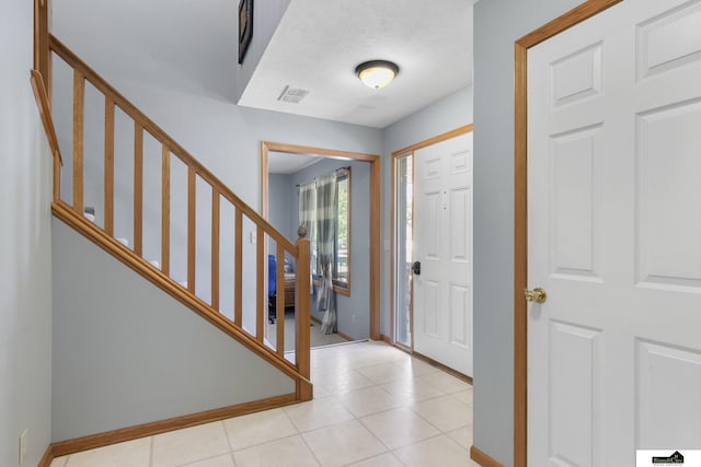9521 N 140th St, Waverly, NE 68462 - entryway featuring baseboards and stairway